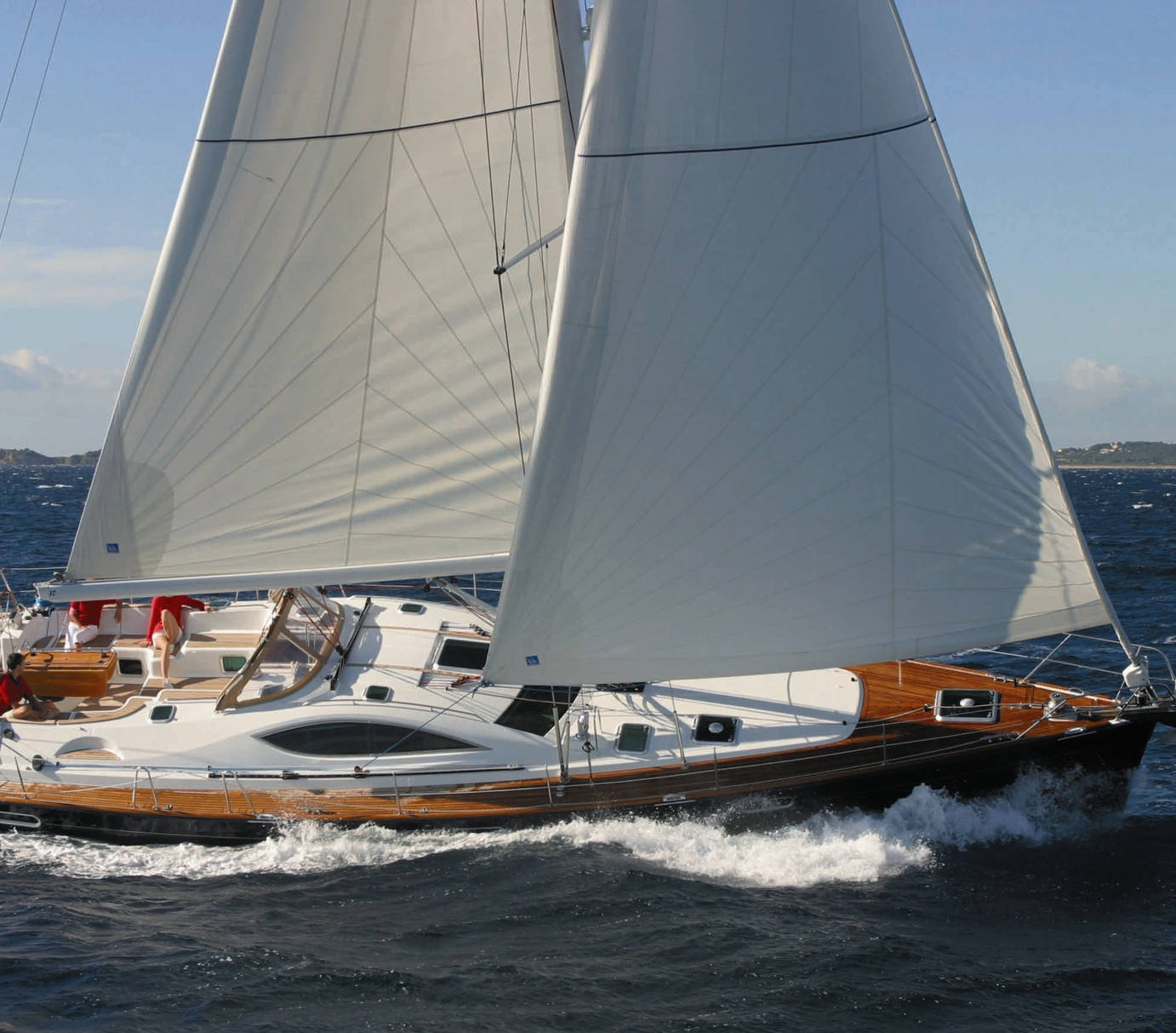 Luxury sailing yacht under full sail during Solent corporate charter experience